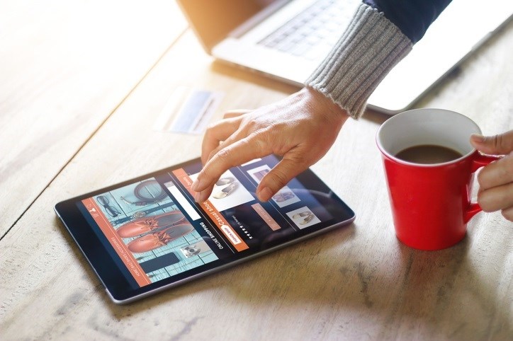 Coffee, computer and tablet.