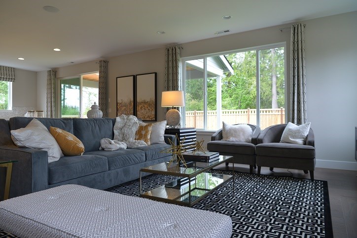 A living room decorated in blues and grays.