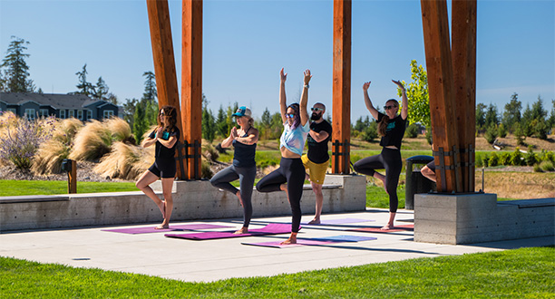 Tehaleh community residents doing yoga in Bonney Lake, WA